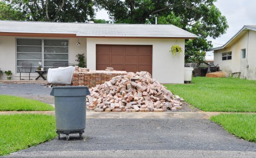 Workers safely removing construction debris